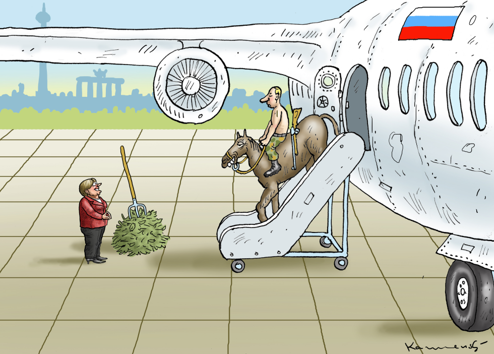 PUTIN VISITS ANGELA MERKEL IN BERLIN