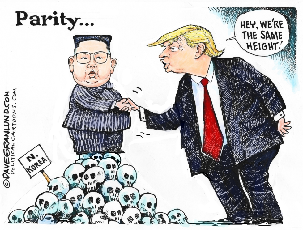 Kim and Trump handshake
