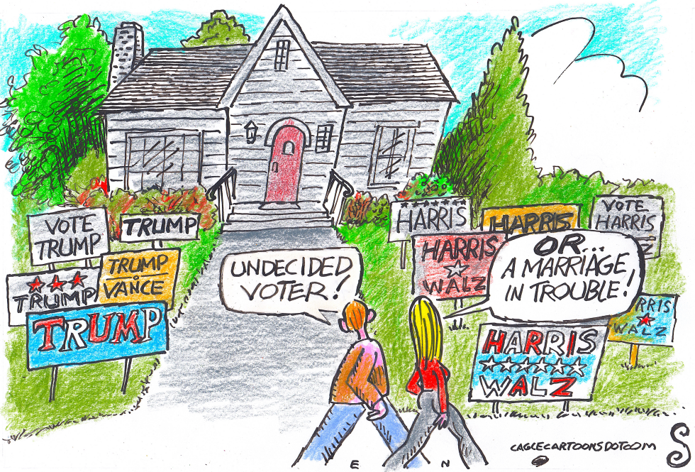 TRUMP AND HARRIS SIGNS IN FRONT OF HOUSE