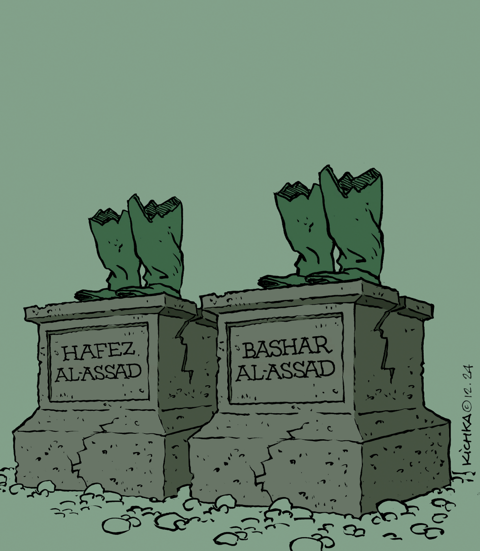broken statues of Assad father and son