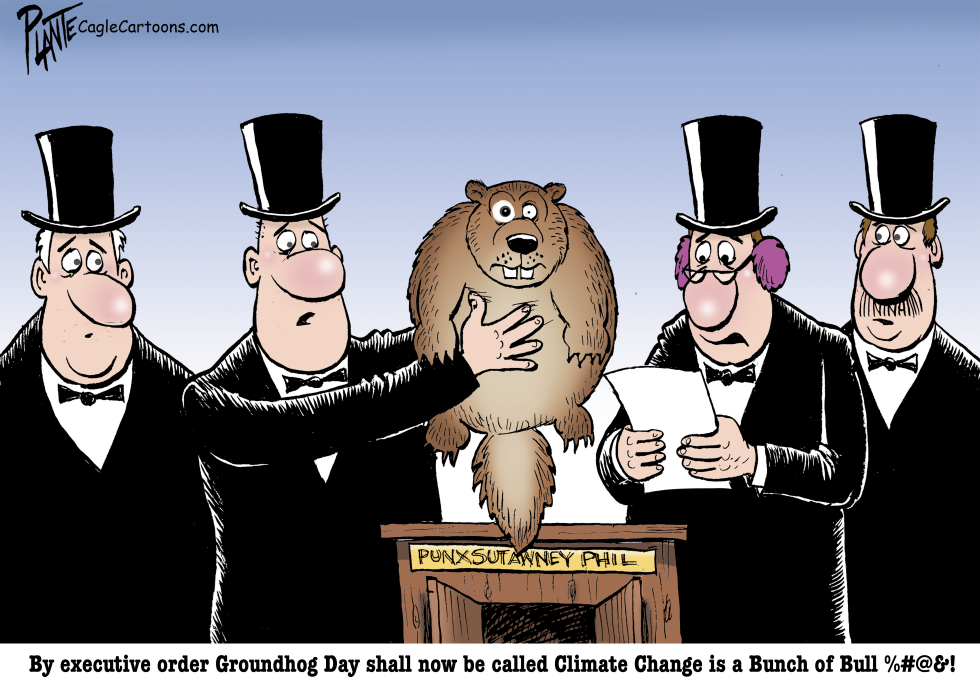 Groundhog Day official holds up a groundhog