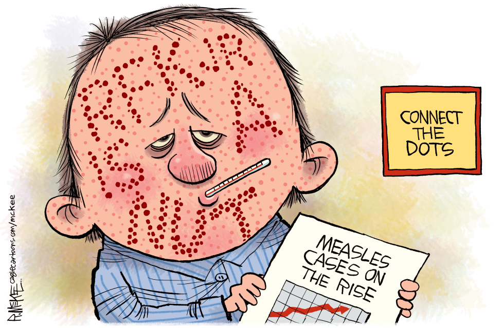 Man with measles spots holds rising cases chart