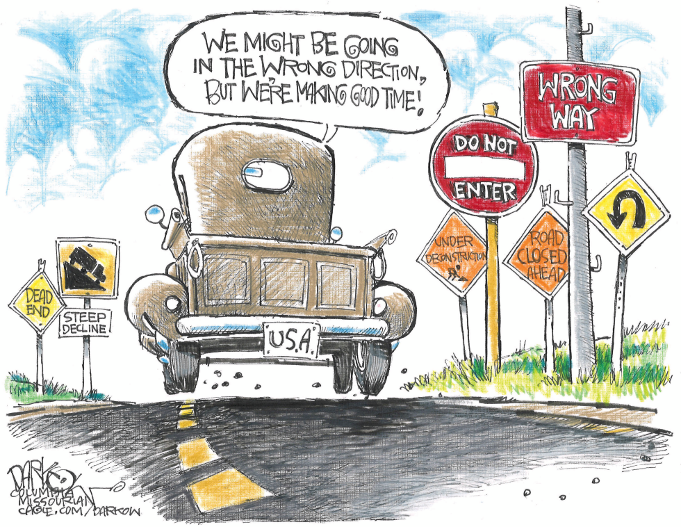 US vehicle nears cluster of warning signs on road