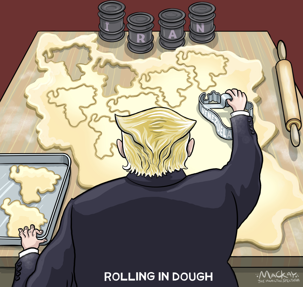 Trump cuts Venezuela shaped cookies out of Iran