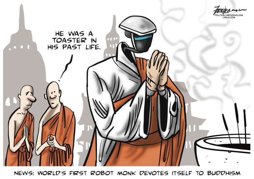 Robot in robes joins Buddhist order as first of its kind
