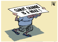 PERSON HOLDS CLIMATE CHANGE HOAX SIGN by Tom Janssen