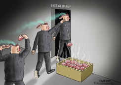 MEN DISCARD BRAINS ENTERING EAST GERMANY by Marian Kamensky