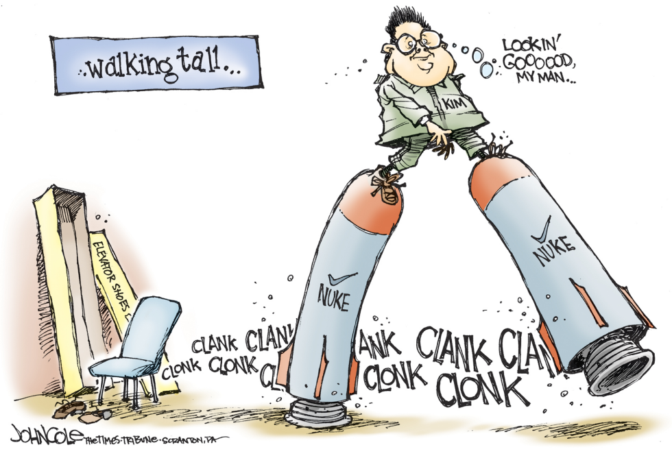 Kim walks tall -- color