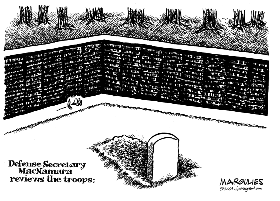 MacNamara  reviews the troops